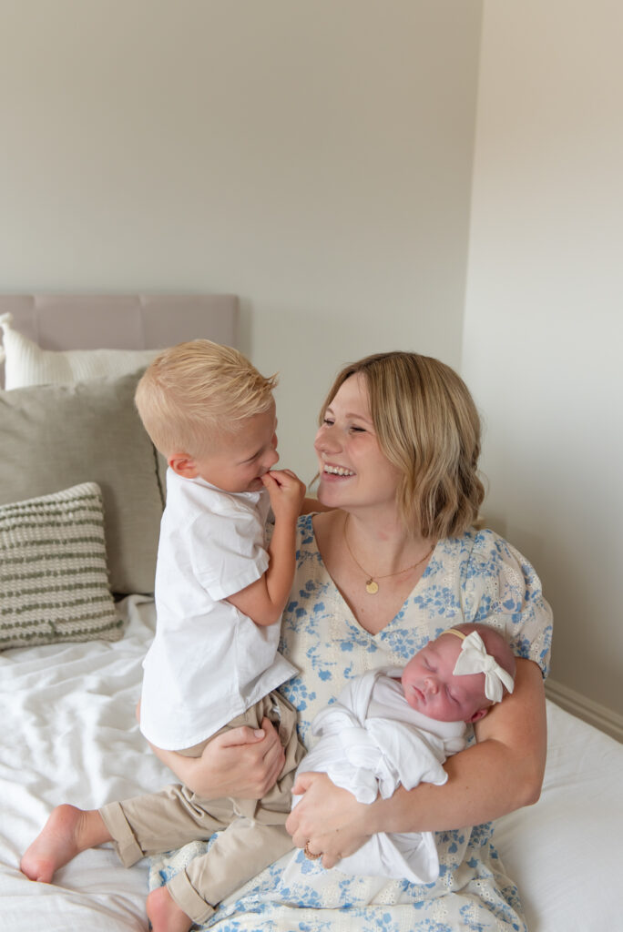 Lifestyle Newborn session mom with toddler and baby in St. George, Utah