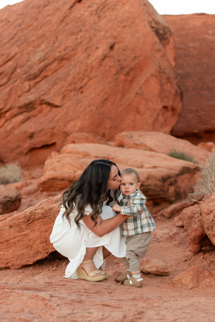 Mom kissing toddler during family photos St. George, Utah