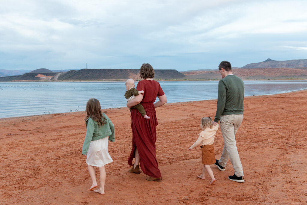 Family explores shore line during southern utah photos