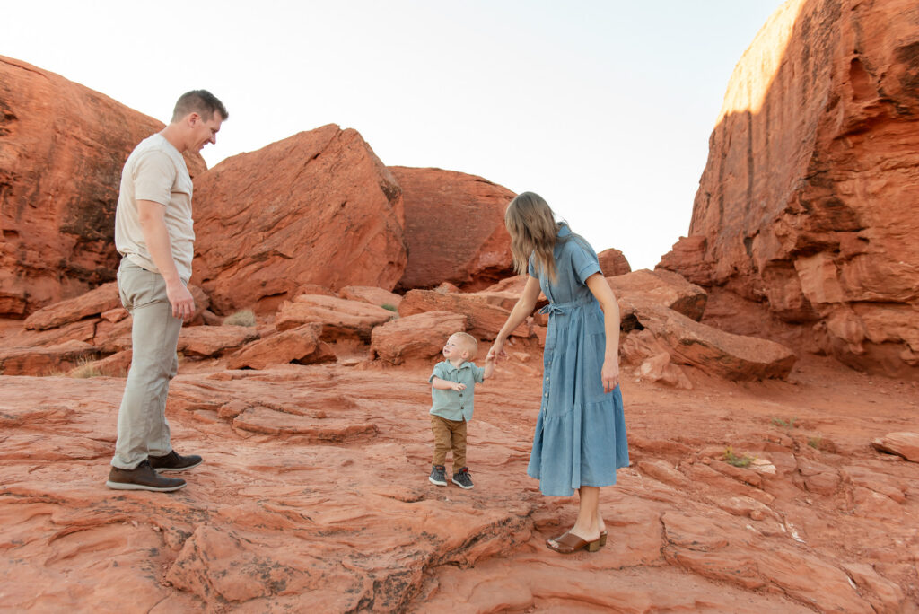 Family exploring red rocks at Pioneer Park St George Utah