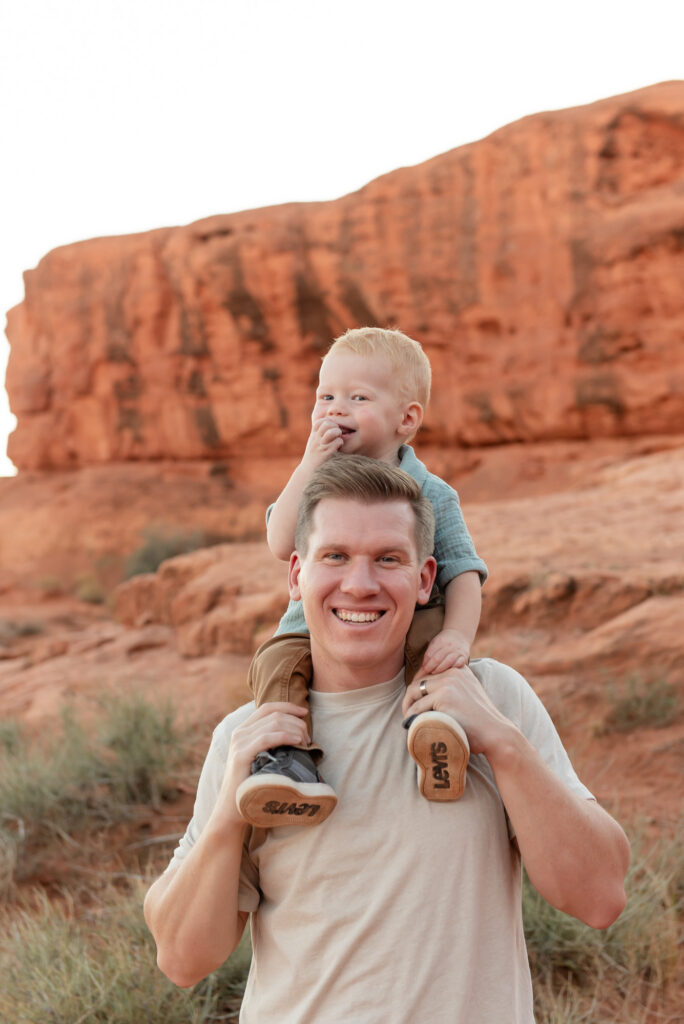 Toddler on shoulders Pioneer Park St George Utah